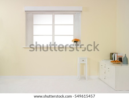 empty room , yellowish wall with window