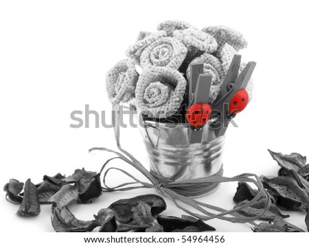Black and white picture with only red color left. Picture of decorative objects