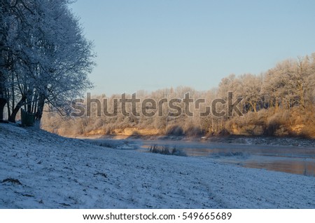 Winter sunrise and frozen river