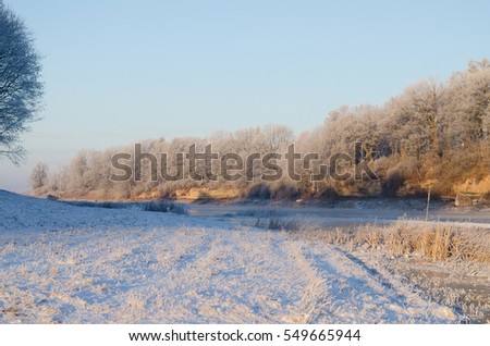 Winter sunrise and frozen river