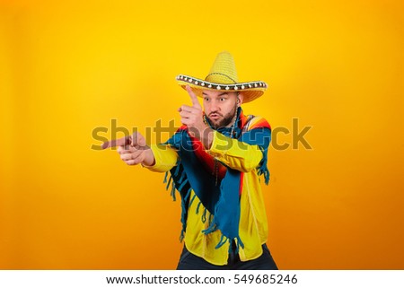 Cheerful and funny man with a Mexican sambrero on a yellow background
