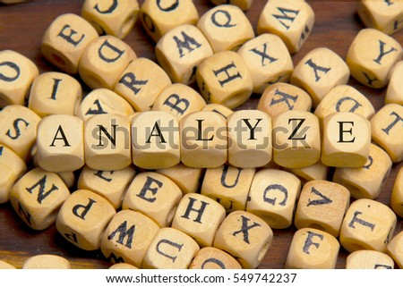 Analyze word written on wood block