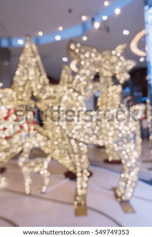 Blur picture : Christmas light in department store
