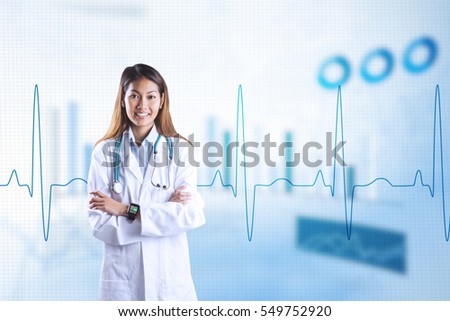 Asian doctor with smart watch crossing arms against blue data
