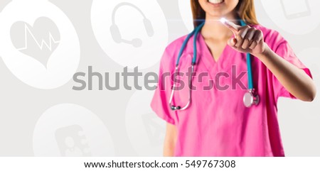 Asian nurse with stethoscope pointing in front of her against medical icons