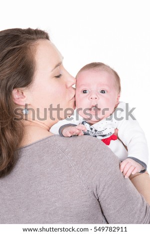 Mother and Baby kissing and hugging. Happy Family