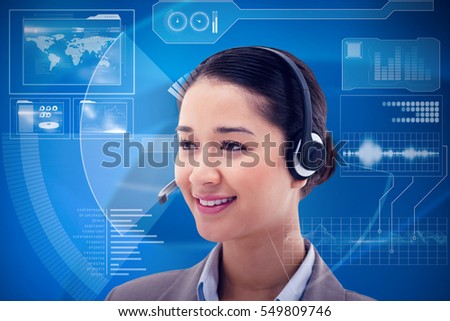 Happy operator posing with a headset against black and grey interface