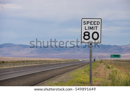 Speed Limit 80 sign on side of interstate highway
