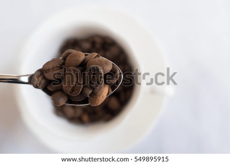 Coffee cup and coffee beans