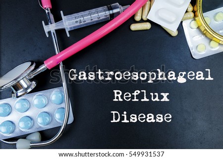 Gastroesophageal Reflux Disease medical term word with medical concepts in blackboard and medical equipment Royalty-Free Stock Photo #549931537