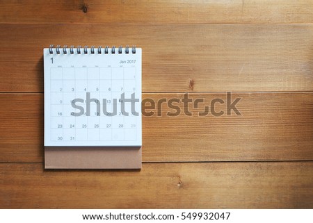 calendar on wooden background Royalty-Free Stock Photo #549932047