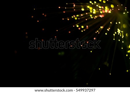 Nong Prajak Public Park Udon Thani, Thailand bokeh LED flowers colorful illuminated plastic optical fibers in dark back.