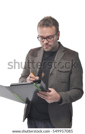 Young man is catching notes isolated on white background