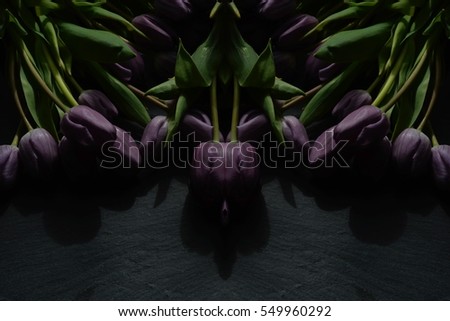 Anniversary tulip flower bouquet. Top view at bunch of fresh tulips, for wedding blog, mothers day gift, valentines love card, birthday interior decoration, magazine. Image with symmetry filter effect