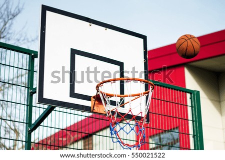 Basketball hoop outside in a school play area