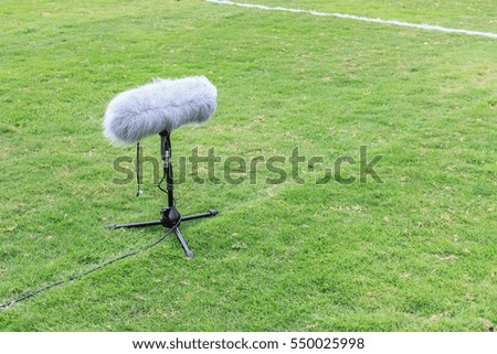 professional sport boom microphone on a football match