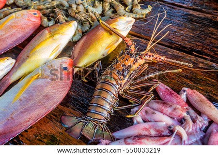 Fresh raw fish and seafood at market