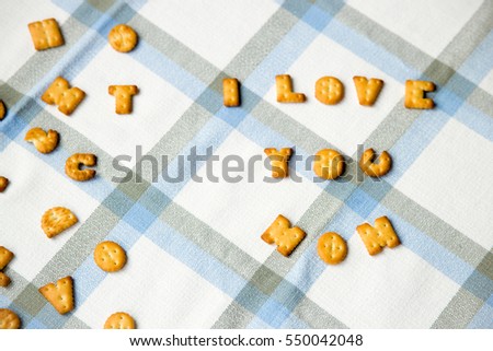 mother's day greeting. mom I love you phrase laid of coocies