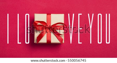 gift and the words "I love you" on a red background