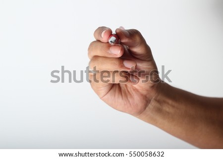 hand holding a pen