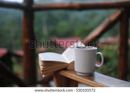 Morning coffee and a book on a patio