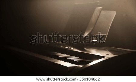 Piano at a Music Studio in Low Light Situation with dark background