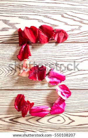 Figures from the petals of flowers of red and pink roses - number five