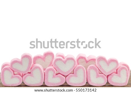 marshmallows on wood background