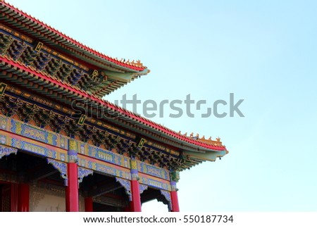 Chinese temple style with blue sky background.