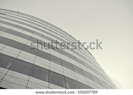 Modern building. Modern office building with facade of glass.Black and white