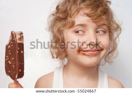 Child eats ice Royalty-Free Stock Photo #55024867