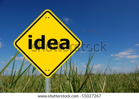creativity and idea concept with yellow road sign
