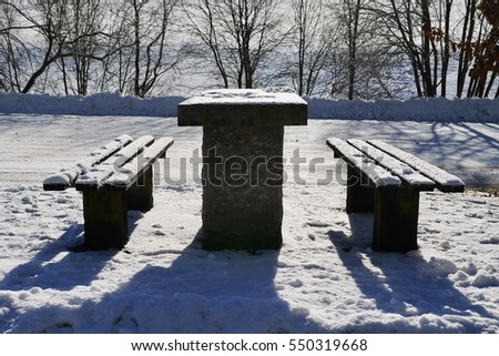 Outdoor Table and Benches Covered in Snow - Light and Shadow