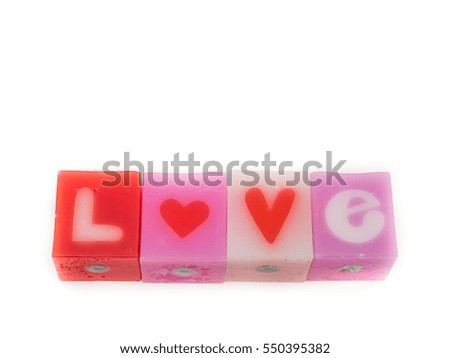 Love letters on the candle with white background. For Valentine Day.