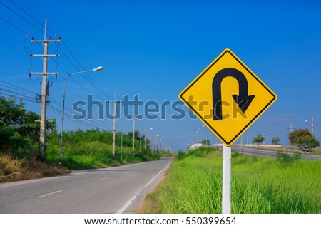 U-turn symbol Road in rustic city in Phitsanulok, Thailand
