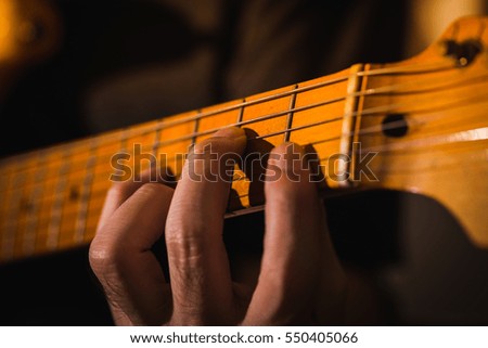 Close Up Guitar Player