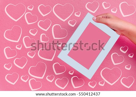 Blank instant photo and small Pink hearts on old dark grunge background.