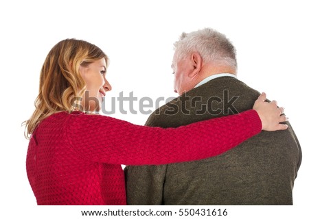 Picture of a young woman helping an elderly man - isolated background