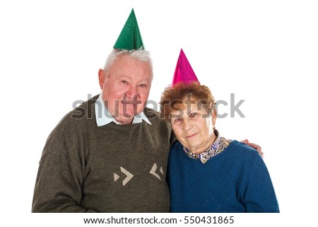Picture of an old couple celebrating anniversary - isolated background