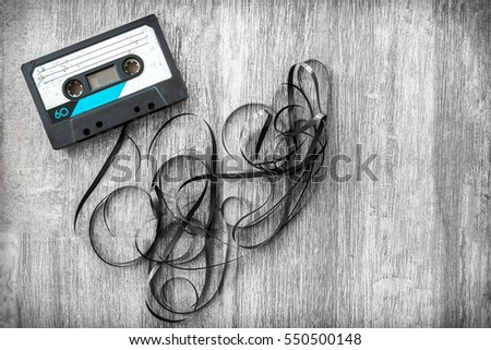 streaming music vintage audio tape rolled out background audiotape wood unroll compact cassette playlist musicassette