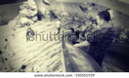 Blurred abstract background of people on escalator