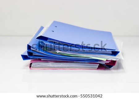 file folder with documents and documents. retention of contracts. 