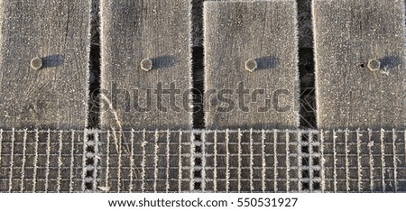 Wooden planks covered with hoar frost 
