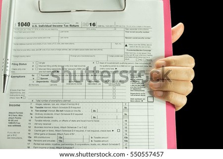 Tax form ready to use on paper clipboard on carry