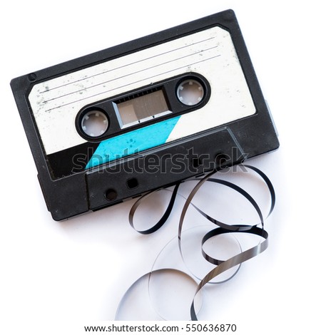 audio tape blank label rolled out isolated white audiotape