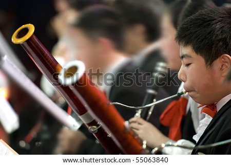 bassoon boy Royalty-Free Stock Photo #55063840