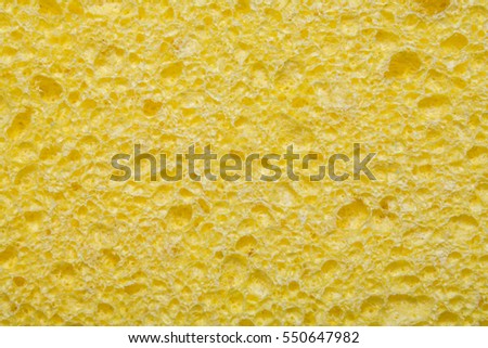yellow sponge texture background Royalty-Free Stock Photo #550647982