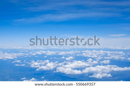view of blue sky and white cloud scenery in soft focus