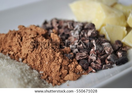 Crushed raw cacao beans wirh cocoa powder and cocoa butter