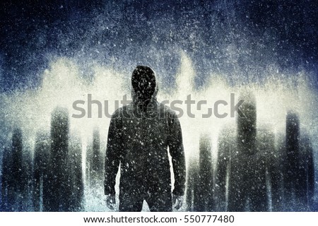 Mysterious gangster in the dark Royalty-Free Stock Photo #550777480